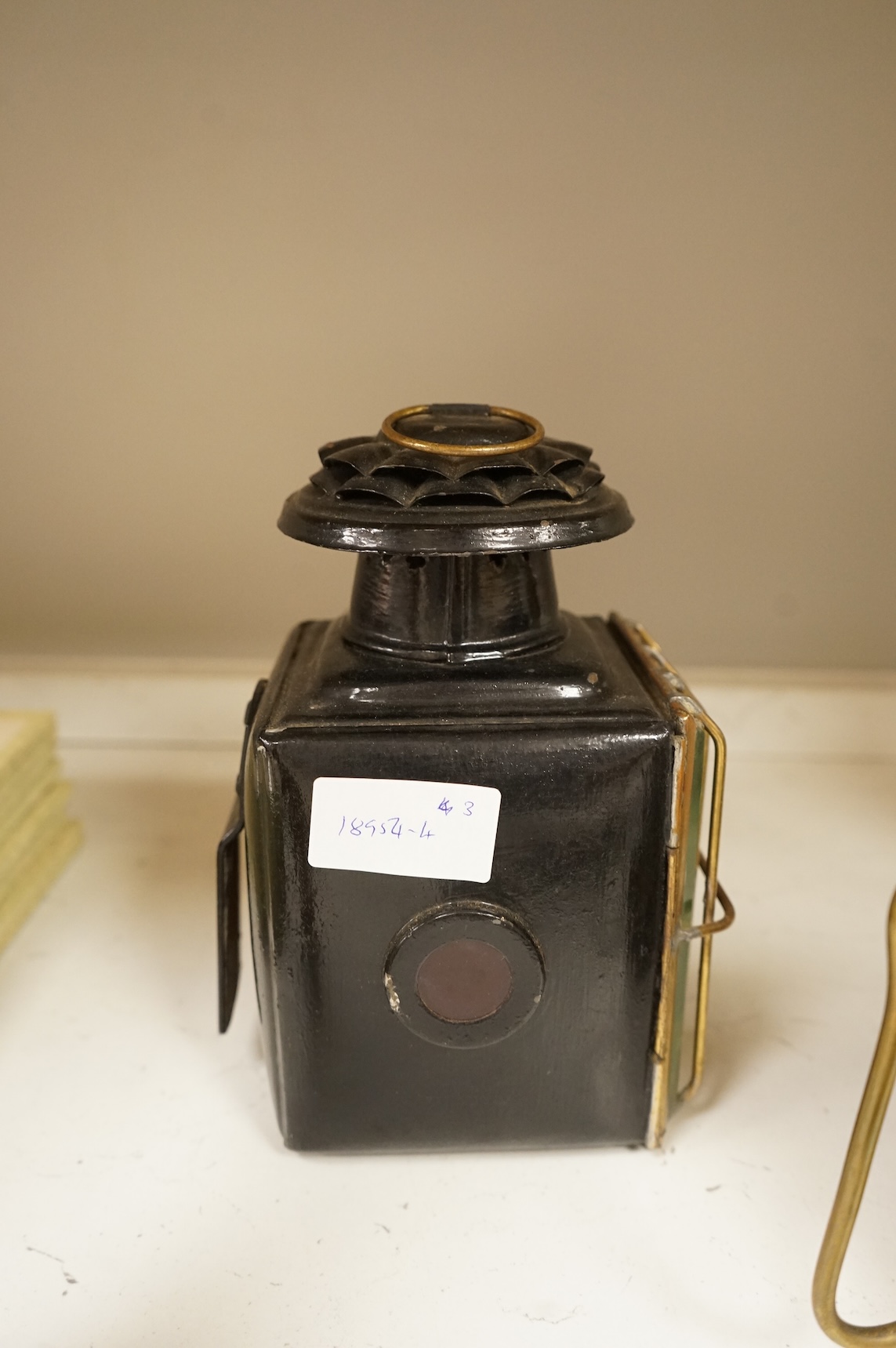 A railway lamp, a vintage Eccles Protector miners lamp and another, largest 17cm high